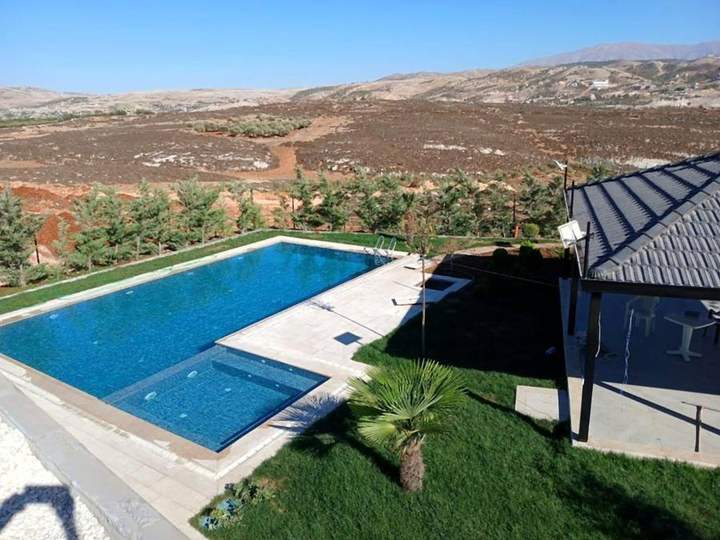 A pool and terrace with sweeping valley views, Machgara